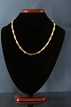 Beautiful gold chain in 14 carat gold, Simple pattern and solid gold.Length: 42 cm.