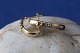 14 karat gold earringswith clear stones, and curved shape.