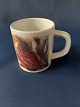 Royal Copenhagen faience, small vintage mug model number 495.Height 7 cm.