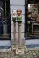 Two Swedish 19th century wooden pedestals with marbled ocher / sand colored paint...