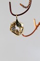 Pendant for gold chain in 14 carat gold, with a Brilliant. Great futuristic look.