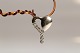 Heart in 14 carat white gold, with diamonds in pendant. Very elegant necklace.Stamped 585.