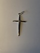 Cross with a diamond in 14 carat white gold