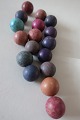 Antique ballsThese antikke balls are made of clay and painted with coloured glazeIn the old days it was normal to play with these ballsIn a good condition