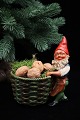 Old painted terracotta elf with a wicker basket for nuts, Christmas sweets or for a block candle...