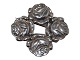 Peter Christian Jensen sølvBroche lavet af fire knapper fra 1915-1937