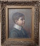 Portrait of young boy in plaster/wooden frame 1916​