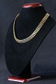 Gold necklace in 14 carat gold with V pattern and box lock. Stamped 585.Length: 43 cm.