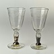 2 antikke glas på fodsølv om stilk
