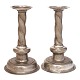 Pair of late 17th century pewter candelsticks dated 1678. "Johann Erdmann Maria Helenea Nevmann Pensionarivs". H: 33cm. D base: 19cm