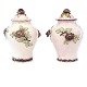 Pair of polychrome decorated lidded faience vases. Rörstrand, Sweden, circa 1770. H: 34cm