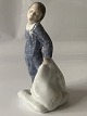 Royal porcelain figure, boy with pillow, from Royal Copenhagen.1st sorting, Dec. 2604