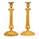 Et par lueforgyldte bronzestager. Frankrig ca. år 1810-20. H: 31cm