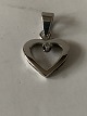 Pendant 14 carat white gold, shaped like a heartwith a diamond