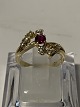 Gold ring in 14 carat gold, with red ruby ​​and diamonds. Size 51.