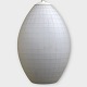 Oval white glass lamp with checkered pattern.DKK 475
