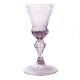 Stor rigt slebet glaspokal prydet med kronede monogrammer for prinsesserne Charlotte Amalie, Sophie Magdalene, Wilhelmine Caroline og Louise.  Pokalen er omtalt  i "Der Glasfreund" September 2008 og tilskrevet Nøstetangen ca.  175