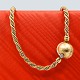 Ole Lynggaard;  Clasp of 14k gold and white gold set with diamonds.