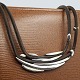 Georg Jensen, Anette Kræn; Necklace in sterling silver with leather #310