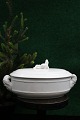 Old Swedish oval Christmas terrine in white porcelain with a lying elf on the lid...