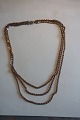 A beautiful and old necklace in 3 rows L: about 48cmNo stampIn a good condition