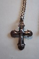 Necklace made of silwer with a beautiful and unusual crossClosed back as it was made from the silwersmiths by the upper jewellery A very good work from the Danish silwersmith Stamp chain: 925 JAA (Guld-/sølvsmed Jens Aagaard, Svendborg Denmark)Sta