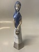 Large figurine of Girl with Basket.Height 21.5 cm.