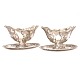 Pair silver sauce boats by A. Michelsen, Copenhagen, dated 1898 & 1901. H: 13cm. L: 22cm. W: 1.244gr