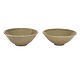 Et par Per Weiss skåle i stentøj med celadon glasur. Signeret Weiss 20. H: 6cm. D:14,5cm
