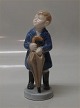 Royal Copenhagen figurine of the month 4526 April - boy with umbrella