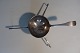 Antik tesi af sølv med initialerFra 1800-talletIkke stempletL: ca. 16cm med håndtag, selv tesien er ca. 5cm i diameter