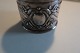 Napkin ring made of silverWith initialsDiam: 5cm W: 3,5cm In a good condition, but with a little crack at the rim (please look at the photo)