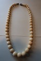 Old necklace made of boneFrom GreenlandL: 40cmIn a very good condition