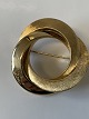 14 Karat gold broochDiameter 3.6 cm.