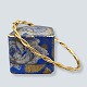 Snoet armring i 8 kt. guld