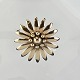 John LauritzenBroche blomst