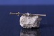 Beautiful gold brooch in 14 karat gold, with clear stone. Stamped JGA 585.