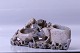 Table sculpture made of soapstone with a beautifully detailed animal motif and two compartments.