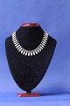 Volmer Bahner necklace of gold-plated silver & white enamelLength: 38.5 cmSOLD