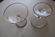 Likørglas med guldkant på både kummen og fodenDer er smukt mønter i  bunden af glassetFra 1950-erneHaves: 8 stk.Pris pr. stk: DKK 25,- Pris for alle 8 glas samlet: DKK 145,-Sælges helst samlet