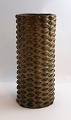 Lundin Antique præsenterer: Royal Copenhagen. Aksel Salto. Cylindrisk stentøjsvase med i knoppet stil. Højde 21 cm.