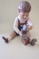 Dahl Jensen (DJ) figurDreng med klodserNr.: 11671. SorteringH: 13,5cm