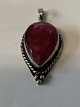 Neck pendant with red stone in silver.Length with eyelet 2.6 cm.