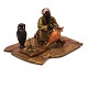 Wienerbronze i form af vasedekoratør. Signeret Franz Bergmann. H: 5,8cm. Base: 7,5x9cm