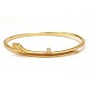 An oval 18kt gold "Snakes"-bangle by Ole Lynggaard, Copenhagen. Size inside: 5,9x4,8cm