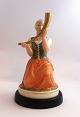 Royal Copenhagen. The girl with the golden horn. Model 12242 Height 21 cm. (1 quality)