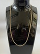 Faceted armor chain in 14 carat gold, stamped 585. Length 44 cm.