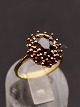 14 karat guld ring med talrige granater