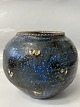 Ceramic vase in a beautiful timeless design. Height: 13 cm.
