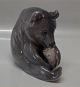 Royal Copenhagen figurine 0351 - 1233 RC Bear chewing toe, Erik Nielsen 1901 16 cm, brown